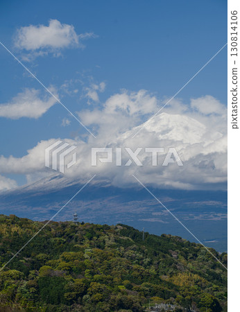 landscape captures the peaceful coexistence of urban life and nature in rural Japan. In the distance, the iconic Mount Fuji rises majestically, Japan 130814106