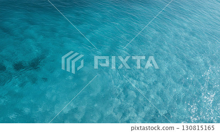 Serene turquoise sea, gentle ripples, crystalline waters. Evokes tranquility, ideal for travel, relaxation, or environmental themes. Use for backgrounds  more. 130815165