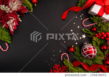 Christmas Greenery with Red Ornaments and Candy Canes Christmas Greenery with Red Ornaments and Candy Canes 130816641