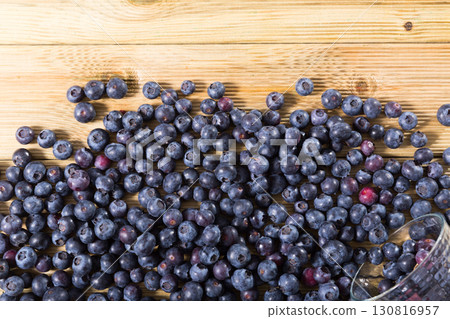 Blueberries on wooden board 130816957