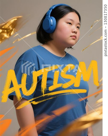 Fashion style portrait of a confident overweight asian autistic girl with blue headphones and shirt with bold yellow autism text for neurodiversity autism pride Fashion style portrait of a confident overweight asian autistic girl with blue headphones and shirt with bold yellow autism text for neurodiversity autism pride 130817350