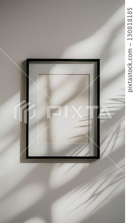 Minimalist black frame white wall plant shadows sunlight horizontal 130818185