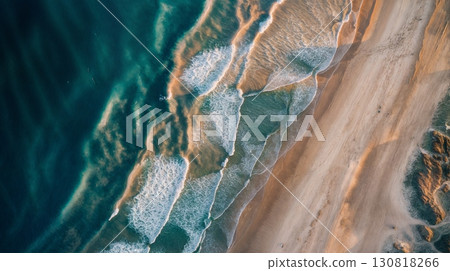 Aerial shot ocean waves crashing sandy beach shoreline details horizontal 130818266