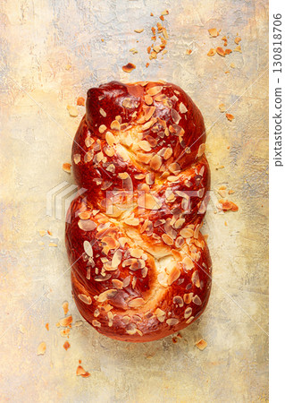 braided, sweet bread pie, with sliced almonds, breakfast, braided bread, brioche, on a light background, top view, no people, 130818706