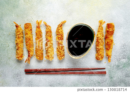 Fried shrimp, peeled in tempura, soy sauce, close-up, 130818714