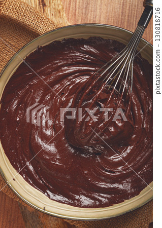 a bowl of chocolate dough, a whisk for whipping, baking, structure and consistency, homemade, top view, no people, 130818716
