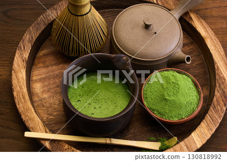 Traditional Matcha Tea Set. A rustic setup with matcha tea powder 130818992