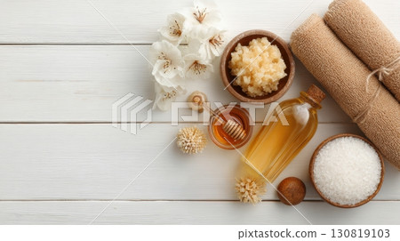 Spa still life composition with rolled white towels Spa still life composition with rolled white towels 130819103