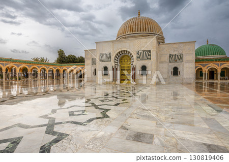 Mausoleum of Habib Bourguiba on a cloudy day with decorated marble courtyard, Monastir 130819406