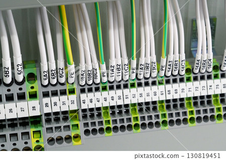 Industrial electrical equipment and wiring.Terminal blocks in electrical cabinet 130819451
