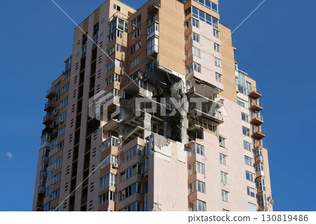 Russian missile damaged multi-storey dwelling building in Kiev city, Ukraine 130819486