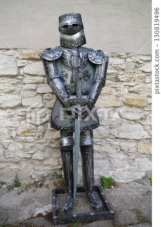 Metal knight armours with sword 130819496