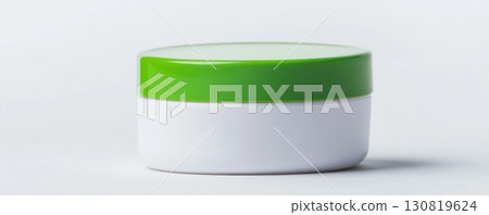 Face cream jar. Mockup of white cosmetic jar with green lid isolated on a white background. Copy space. Beauty product branding template. Plastic container skincare medicals, lotion bottle. Body care Face cream jar. Mockup of white cosmetic jar with green lid isolated on a white background. Copy space. Beauty product branding template. Plastic container skincare medicals, lotion bottle. Body care 130819624