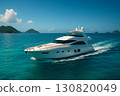 Luxury yacht cruising through clear turquoise waters under a bright blue sky with distant islands 130820049