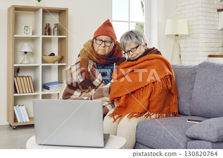 Sick senior family couple having telemedicine consultation with online doctor on laptop Sick senior family couple having telemedicine consultation with online doctor on laptop 130820764