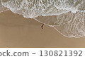 Pregnant Woman Relaxing by the Ocean Aerial Beach Photography 130821392