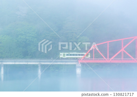 Kitakami Line: Kiha 100 running across Lake Kinshu in the morning mist - Second Waga River Bridge 130821717