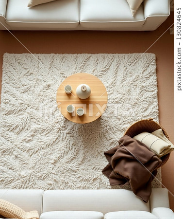 Cozy Minimalist Living Room with Textured Rug and Tea 130824645