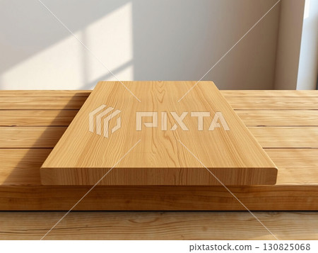 Wooden Tabletop Display: Warm Light and Natural Grain Texture Wooden Tabletop Display: Warm Light and Natural Grain Texture 130825068