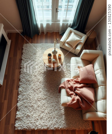 Cozy Living Room Interior - Natural Light, Comfortable Seating, and Elegant Decor Accents 130825390