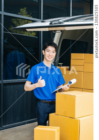 Portrait of courier delivery man searching the address on digital tablet. Delivery service, Portrait of courier delivery man searching the address on digital tablet. Delivery service, 130825505