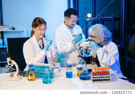 Scientist team meeting and writing analysis results in the laboratory study 130825772
