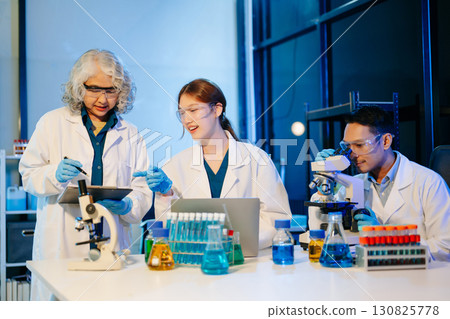 Scientist team with tablet and laptop, laboratory and ecofriendly science. Agriculture, research and scientists Scientist team with tablet and laptop, laboratory and ecofriendly science. Agriculture, research and scientists 130825778