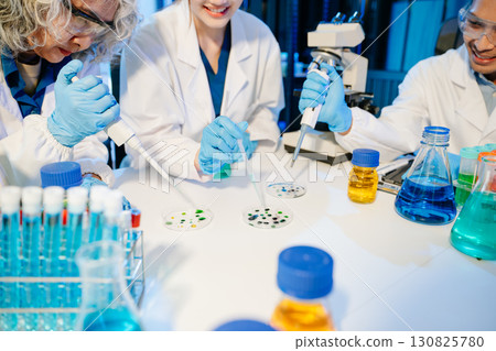 Scientist team with tablet and laptop, laboratory and ecofriendly science. Agriculture, research and scientists Scientist team with tablet and laptop, laboratory and ecofriendly science. Agriculture, research and scientists 130825780