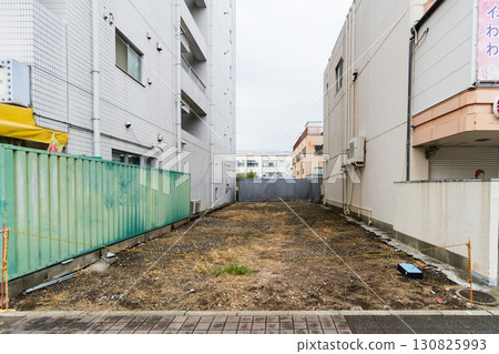 A vacant lot landscape in a residential area A vacant lot landscape in a residential area 130825993
