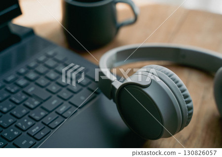 Workspace with laptop and headphones 130826057