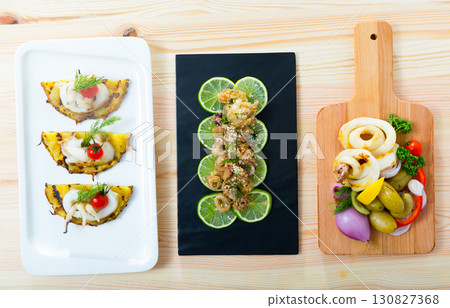 Dishes with squid and sepia Dishes with squid and sepia 130827368