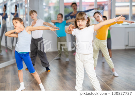 Group of children dancing modern dances Group of children dancing modern dances 130827727