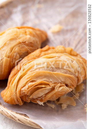 Curry puff stuffed with chicken or sweet potatoes, Thai snack food style Curry puff stuffed with chicken or sweet potatoes, Thai snack food style 130828582