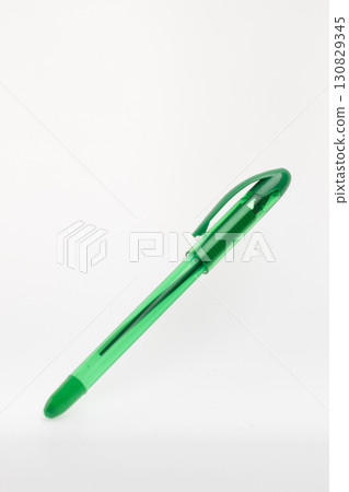 Green pen on white background: vibrant and simple contrast.. Green pen on white background: vibrant and simple contrast.. 130829345