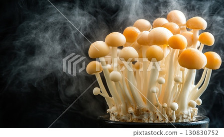 Close Up Shot Of Fresh Mushrooms With Water Droplets And Fog Against Dark Background 130830752
