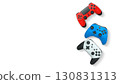 Wireless gaming controllers flying in air isolated on white background with clipping path, symbolizing gaming technology concept. 130831313