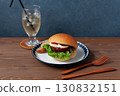 Teriyaki burger on a plate on a wooden table 130832151