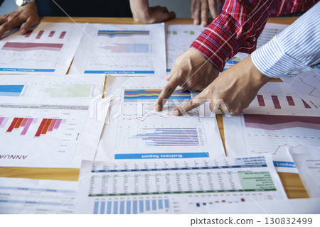 Top view business people meeting together at office desk in conference room. Team business meeting partnership planning brainstorming together. Team Collaborate group of partner company brainstorming 130832499