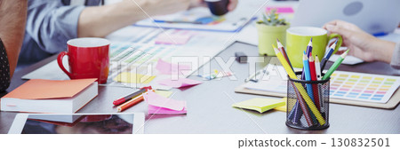 Banner Top view office desk laptop and coffee cup on wood table copy space.  Panorama tabletop notebook laptop coffee cup for officer display empty space wooden background workspace full banner design 130832501