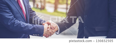 Banner Lawyer teamwork partnership Businessman handshake together. Panorama Two Men Trust honesty lawfirm business handshake promise respect partner. Diversity solidarity team Partner hands together Banner Lawyer teamwork partnership Businessman handshake together. Panorama Two Men Trust honesty lawfirm business handshake promise respect partner. Diversity solidarity team Partner hands together 130832505