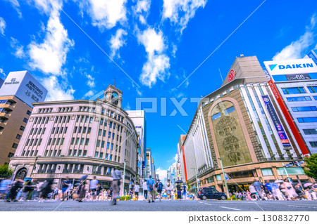 Tokyo cityscape, Japan, September 7. View of the pedestrian zone in Ginza, Tokyo (crossing the street on a green light). 130832770