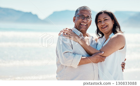 Love, portrait and old couple hug on beach, embrace and romance in happy relationship and mockup. Romantic retirement vacation, senior woman and man hugging on ocean holiday travel with smile on face Love, portrait and old couple hug on beach, embrace and romance in happy relationship and mockup. Romantic retirement vacation, senior woman and man hugging on ocean holiday travel with smile on face 130833088