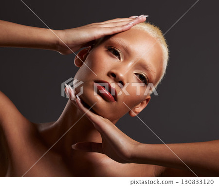 Beauty, makeup and black woman with hands on face in dark studio, platinum hair isolated on grey background. Art aesthetic, cosmetics and African skincare model and luxury spa facial for bronze skin. 130833120