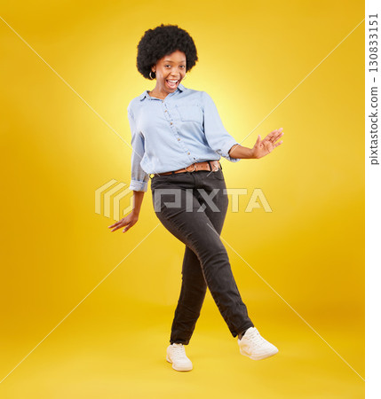 Dance, excited and happy black woman on yellow background with motivation, dancing and smile. Winner mockup, wow portrait and isolated full body of girl for freedom, winning and success in studio 130833151