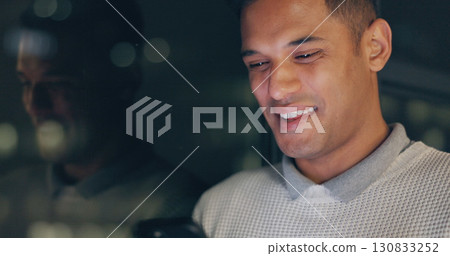 Business, dark and man with a cellphone, smile and connection with email, website info and contact. Person, night and employee with a smartphone, digital app and internet with social media or post Business, dark and man with a cellphone, smile and connection with email, website info and contact. Person, night and employee with a smartphone, digital app and internet with social media or post 130833252