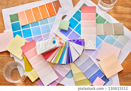 Color palette paper on table for background in design choice, branding and creativity career, project or planning. Colorful charts, sticky note and print paper for creative or brand development above Color palette paper on table for background in design choice, branding and creativity career, project or planning. Colorful charts, sticky note and print paper for creative or brand development above 130833312