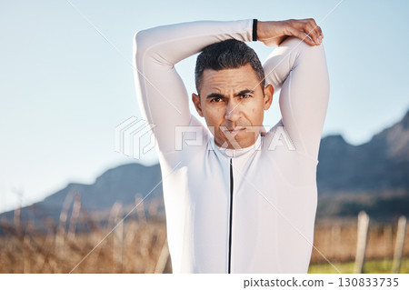 Man, stretching before run and fitness outdoor, portrait with hiking or running in countryside, exercise and warm up. Arms, muscle and strong male runner, start with race for marathon or trekking Man, stretching before run and fitness outdoor, portrait with hiking or running in countryside, exercise and warm up. Arms, muscle and strong male runner, start with race for marathon or trekking 130833735