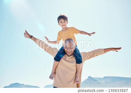 Family, beach and father with boy on shoulder by ocean for bonding, quality time and relaxing on weekend. Travel, smile and happy dad holding child on summer holiday, vacation and adventure together Family, beach and father with boy on shoulder by ocean for bonding, quality time and relaxing on weekend. Travel, smile and happy dad holding child on summer holiday, vacation and adventure together 130833887