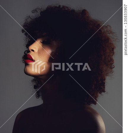 Beauty, shadow and woman with makeup and skincare, cosmetic and self care in the dark or night. Spotlight, creative and face of female model with mystery aesthetic and luxury fashion Beauty, shadow and woman with makeup and skincare, cosmetic and self care in the dark or night. Spotlight, creative and face of female model with mystery aesthetic and luxury fashion 130833907