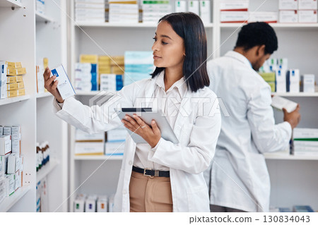 Pharmacy stock tablet, Indian pharmacist and nurse checklist of medicine and pills. Woman, digital work and pharmaceutical products in a retail shop or clinic with healthcare and wellness employee Pharmacy stock tablet, Indian pharmacist and nurse checklist of medicine and pills. Woman, digital work and pharmaceutical products in a retail shop or clinic with healthcare and wellness employee 130834043